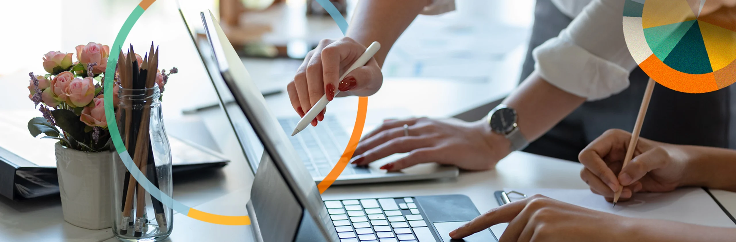 People leaning over desk looking at data on computer, overlayed with multicolored circles representing data sets in LPC Associates brand colors